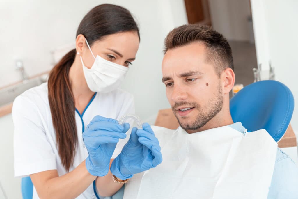 Dentist shows Invisalign® in Mississauga